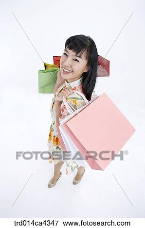 body, wholebody, smile, laugh, laughter, shopping, shoppingbag View Large Photo Image Stock Photo - body, wholebody, smile, laugh, laughter, shopping, shoppingbag. Fotosearch