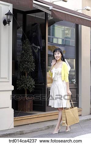 shop, store, shopping, consumption, spending, expenditures, smile View Large Photo Image Stock Photo - shop, store, shopping, consumption, spending, expenditures, smile. Fotosearch