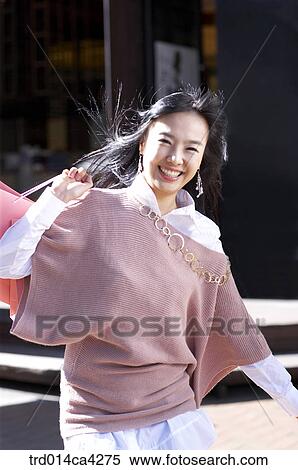 smile, laugh, laughter, necklace, shopping, paperbag View Large Photo Image Stock Photography - smile, laugh, laughter, necklace, shopping, paperbag. Fotosearch