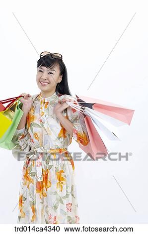 smile, laugh, laughter, paperbag, shopping, sunglasses, object View Large Photo Image Stock Image - smile, laugh, laughter, paperbag, shopping, sunglasses, object. Fotosearch
