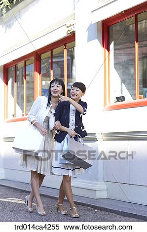 smile, laugh, laughter, shop, store, shopping, shoppingbag View Large Photo Image Stock Photography - smile, laugh, laughter, shop, store, shopping, shoppingbag. Fotosearch