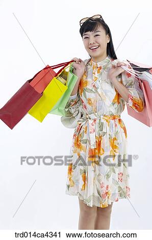 smile, laugh, laughter, shopping, shoppingbag, paperbag, yellow View Large Photo Image Stock Image - smile, laugh, laughter, shopping, shoppingbag, paperbag, yellow. Fotosearch