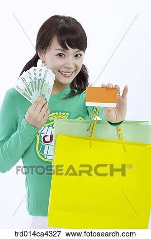 smile, laugh, laughter, shopping, shoppingbag, paperbag, yellow View Large Photo Image Stock Photo - smile, laugh, laughter, shopping, shoppingbag, paperbag, yellow. Fotosearch