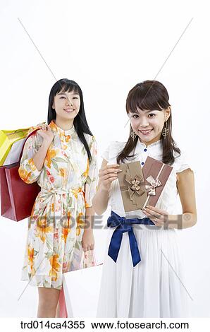 smile, laugh, laughter, shopping, shoppingbag, paperbag, yellow View Large Photo Image Stock Photography - smile, laugh, laughter, shopping, shoppingbag, paperbag, yellow. Fotosearch