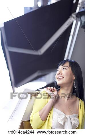 smile, laugh, laughter, shoppingbag, yellow, shopping, consumption View Large Photo Image Picture - smile, laugh, laughter, shoppingbag, yellow, shopping, consumption. Fotosearch