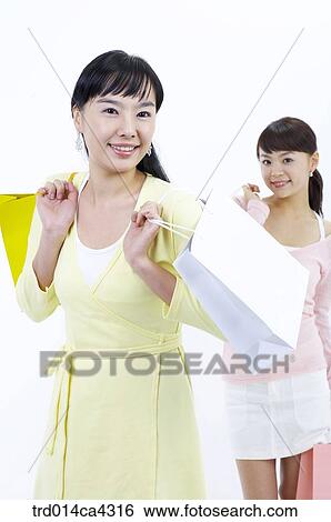 smile, laugh, laughter, shoppingbag, paperbag, yellow, pink View Large Photo Image Stock Photograph - smile, laugh, laughter, shoppingbag, paperbag, yellow, pink. Fotosearch