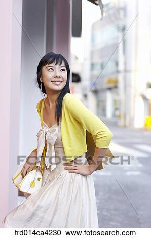 yellow, smile, laugh, laughter, bag, pose, shopping View Large Photo Image Stock Image - yellow, smile, laugh, laughter, bag, pose, shopping. Fotosearch