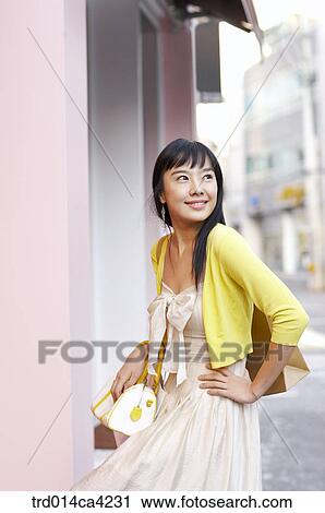 yellow, smile, laugh, laughter, bag, pose, shopping View Large Photo Image Stock Image - yellow, smile, laugh, laughter, bag, pose, shopping. Fotosearch