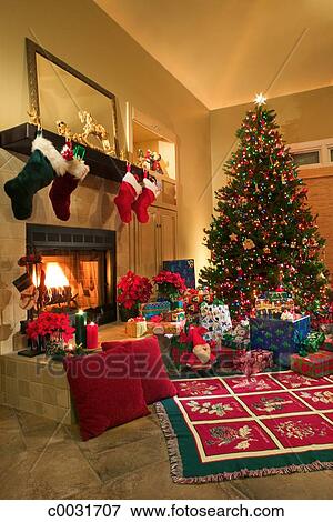 Interior View Of A Living Room At Christmas With Decorations Tree