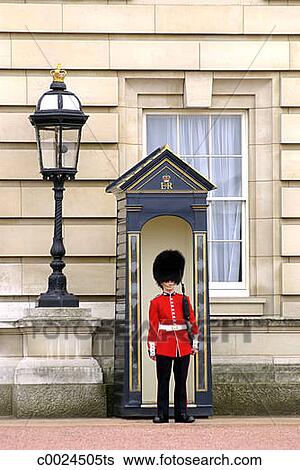 Stock Images of A Beefeater guard stands watch at Buckingham Palace in ...