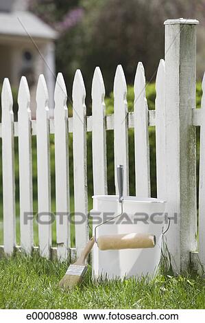 Pictures Of Paint Bucket Next To White Picket Fence E00008988 Paint Bucket Next To White Picket Fence