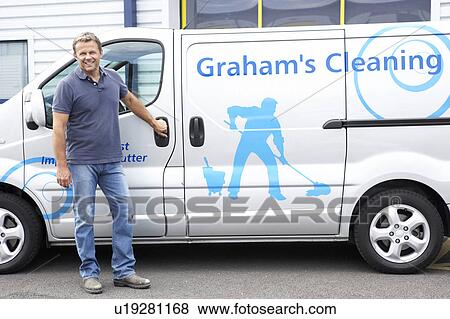 Cleaner standing next to van View Large Photo Image Stock Photo - Cleaner standing next to van. Fotosearch