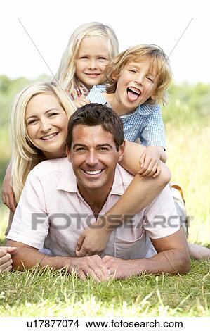 Family having fun in countryside View Large Photo Image Picture - Family having fun in countryside. Fotosearch