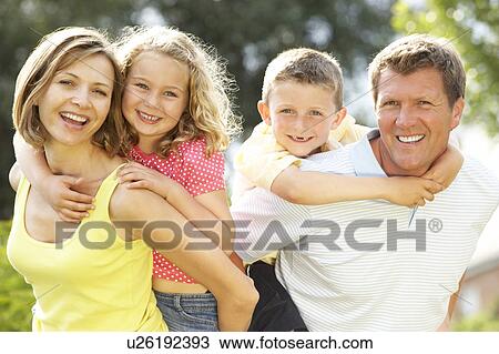 Family having fun in countryside View Large Photo Image Stock Image - Family having fun in countryside. Fotosearch