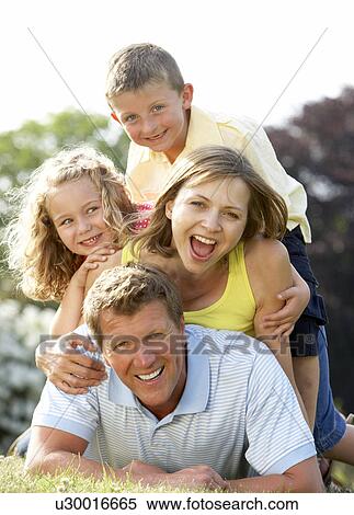 Family having fun in countryside View Large Photo Image Stock Photography - Family having fun in countryside. Fotosearch