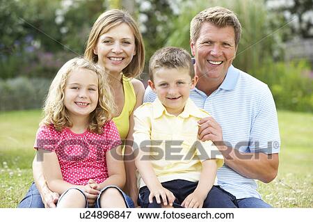 Family relaxing in countryside View Large Photo Image Stock Photo - Family relaxing in countryside. Fotosearch