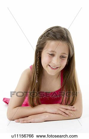 Stock Photograph - Girl Laying on Stomach. Fotosearch