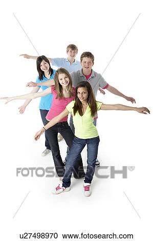 Stock Image - Group of Teenage Friends in Studio . Fotosearch