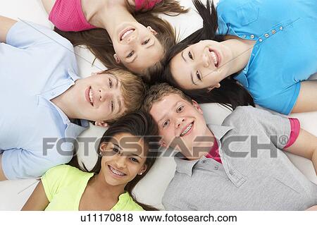 Group of Teenage Friends in Studio View Large Photo Image Stock Photo - Group of Teenage Friends in Studio . Fotosearch