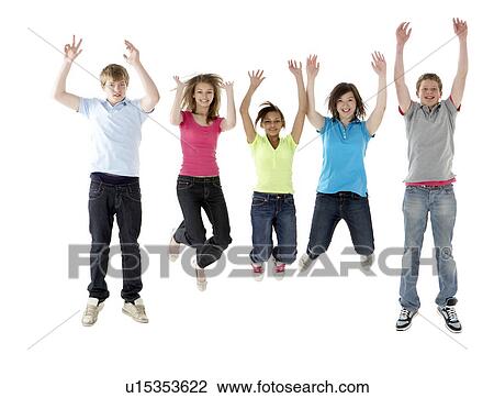 Stock Image - Group of Teenage Friends Jumping in Studio. Fotosearch