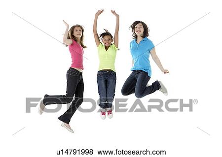 Group of Teenage Girlfriends Jumping in Studio View Large Photo Image Stock Photo - Group of Teenage Girlfriends Jumping in Studio. Fotosearch