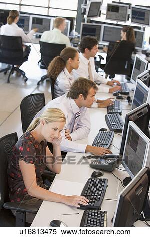 High Angle View Of Stock Traders At Work View Large Photo Image Stock Photography - High Angle View Of Stock Traders At Work. Fotosearch