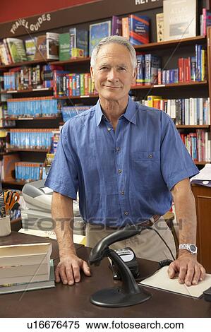 Stock Photography - Male bookshop proprietor. Fotosearch