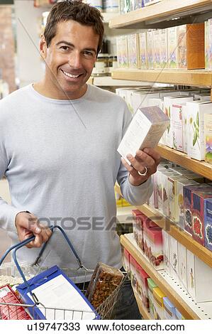 Male customer buying herbal tea View Large Photo Image Stock Image - Male customer buying herbal tea. Fotosearch