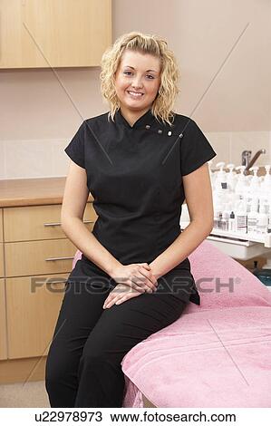 Stock Image - Portrait of beauty therapist. Fotosearch