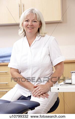 Portrait of chirpodist in clinic View Large Photo Image Stock Image - Portrait of chirpodist in clinic. Fotosearch