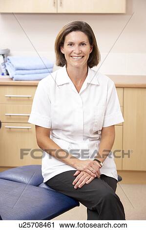 Stock Image - Portrait of chirpodist in clinic. Fotosearch