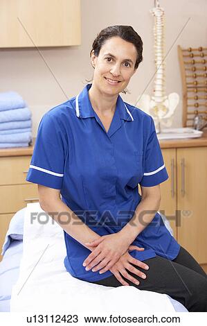 Portrait of female osteopath View Large Photo Image Stock Image - Portrait of female osteopath. Fotosearch