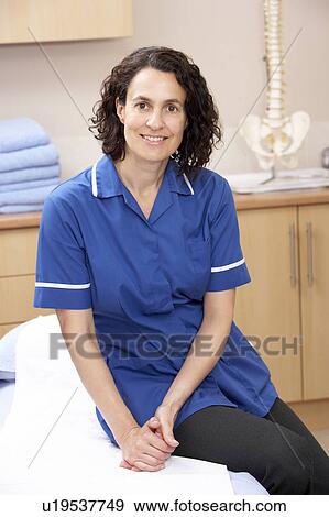 Stock Photo - Portrait of female osteopath. Fotosearch