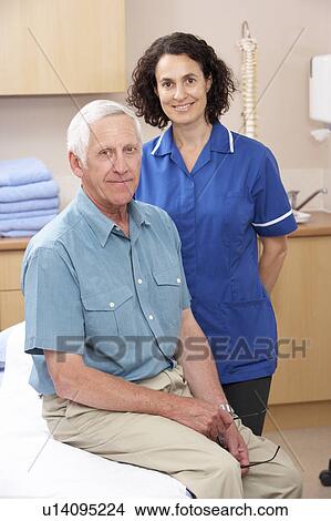 Picture - Portrait of male and female osteopath. Fotosearch