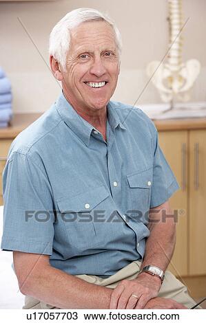 Portrait of male osteopath View Large Photo Image Stock Image - Portrait of male osteopath. Fotosearch