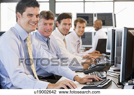 Stock Traders At Work View Large Photo Image Stock Image - Stock Traders At Work. Fotosearch