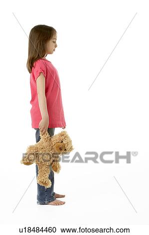 Studio Portrait of Girl Standing with Teddy Bear View Large Photo Image Stock Image - Studio Portrait of Girl Standing with Teddy Bear. Fotosearch