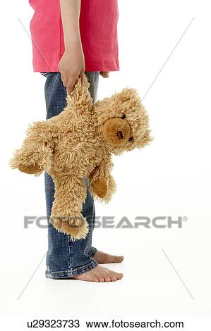 Studio Portrait of Girl Standing with Teddy Bear View Large Photo Image Stock Image - Studio Portrait of Girl Standing with Teddy Bear. Fotosearch