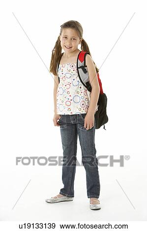 Studio Portrait of Girl Standing with backpack View Large Photo Image Stock Photo - Studio Portrait of Girl Standing with backpack. Fotosearch