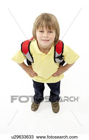 Studio Portrait of Smiling Boy Holding Ruck Sack View Large Photo Image Stock Image - Studio Portrait of Smiling Boy Holding Ruck Sack. Fotosearch