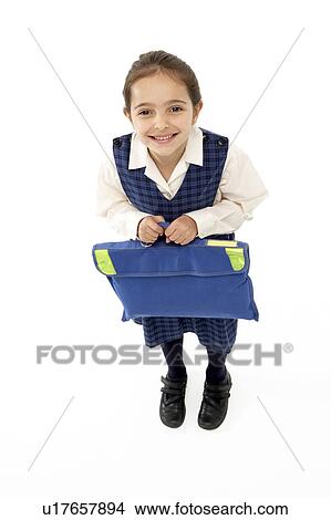 Studio Portrait of Smiling Girl Holding School Bag View Large Photo Image Picture - Studio Portrait of Smiling Girl Holding School Bag. Fotosearch