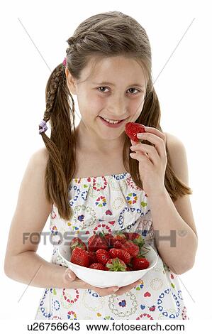 Studio Portrait of Smiling Girl Holding Bowl of Strawberries View Large Photo Image Stock Image - Studio Portrait of Smiling Girl Holding Bowl of Strawberries. Fotosearch