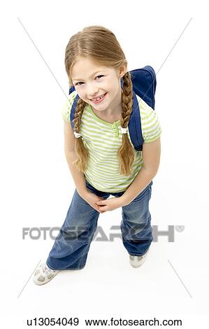 Stock Photo - Studio Portrait of Smiling Girl Wearing School Bag. Fotosearch