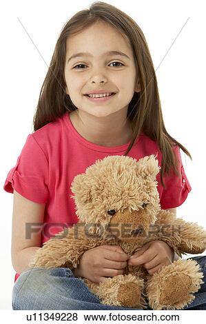 Studio Portrait Of Smiling Girl with Teddy Bear View Large Photo Image Stock Photo - Studio Portrait Of Smiling Girl with Teddy Bear. Fotosearch