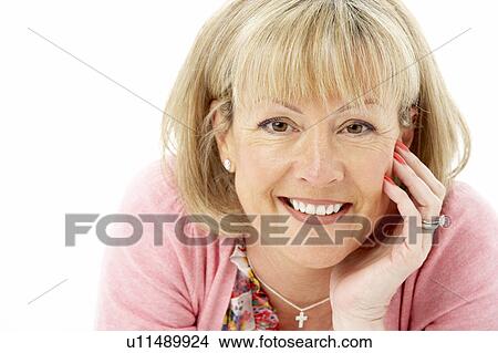 Studio Portrait of Smiling Mother View Large Photo Image Picture - Studio Portrait of Smiling Mother. Fotosearch