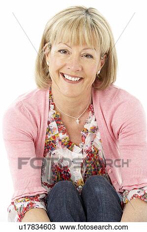 Studio Portrait of Smiling Mother View Large Photo Image Stock Image - Studio Portrait of Smiling Mother. Fotosearch