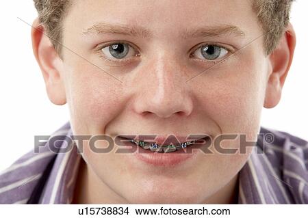 Picture - Studio Portrait of Smiling Teenage Boy. Fotosearch