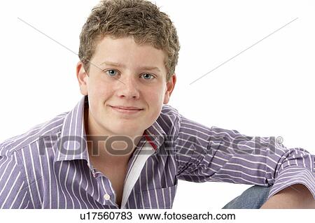 Stock Image - Studio Portrait of Smiling Teenage Boy. Fotosearch