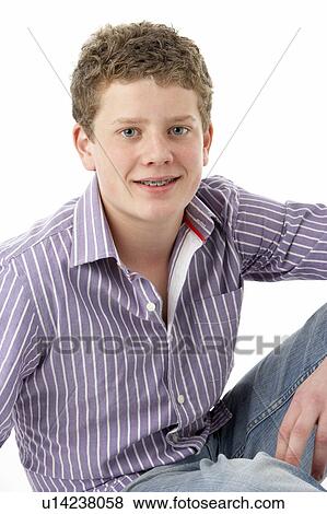 Stock Photo - Studio Portrait of Smiling Teenage Boy. Fotosearch