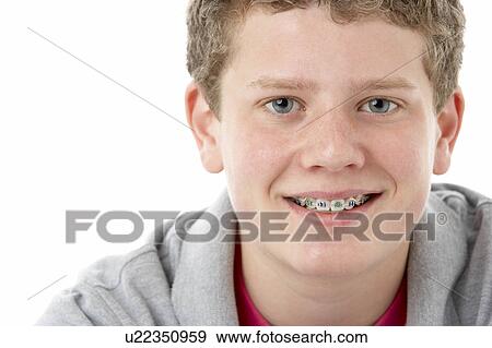 Studio Portrait of Smiling Teenage Boy View Large Photo Image Stock Photo - Studio Portrait of Smiling Teenage Boy. Fotosearch